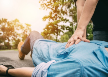 CPR administered on the road to a man who collapsed from a heart attack; nurses praised for their heroic effort.